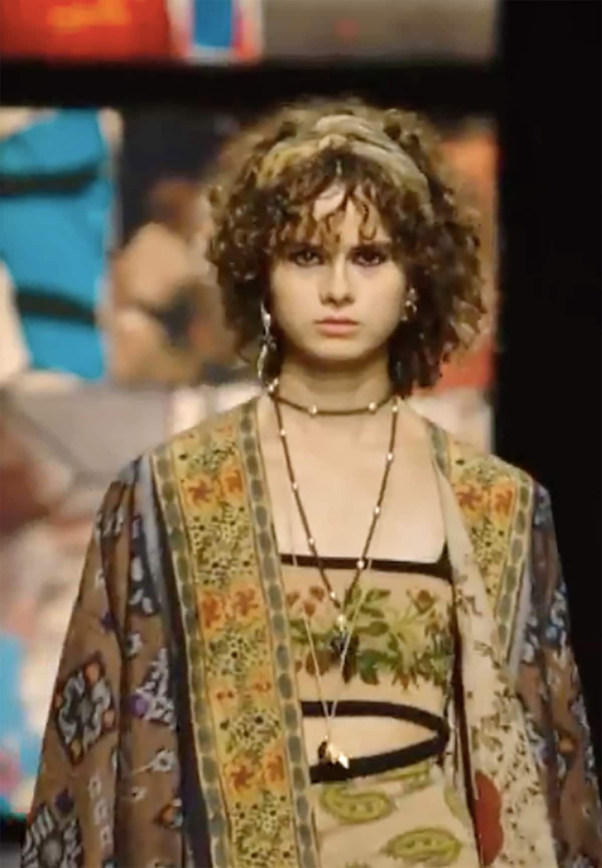 a girl wearing Endek in runway